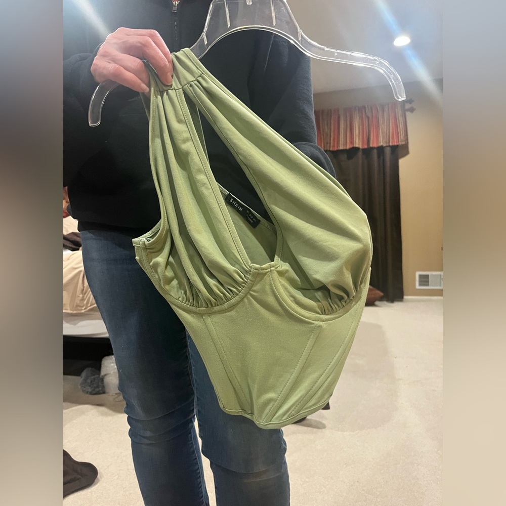 green one shoulder going out top